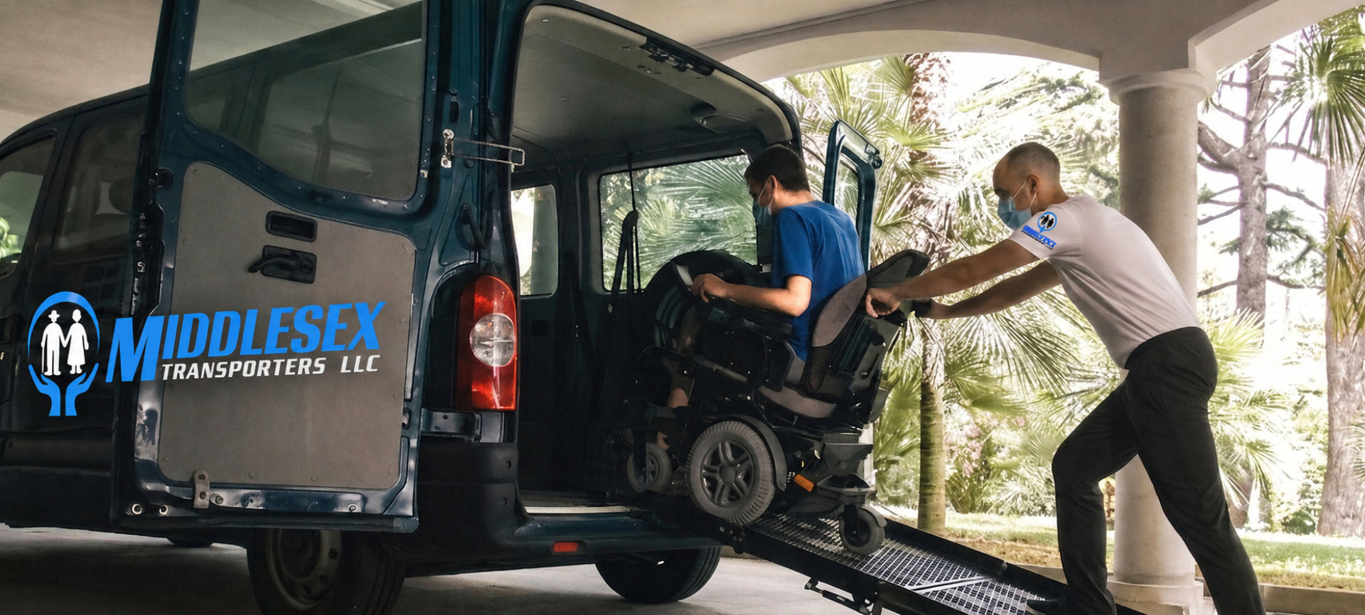 man assisting elder in wheelchair