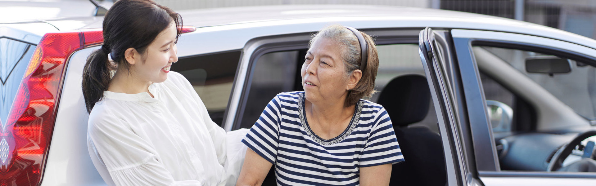 Woman Helping Senior Woman